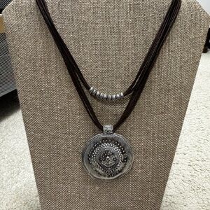 Silver Pendant Necklace with multi-stand Brown Cord